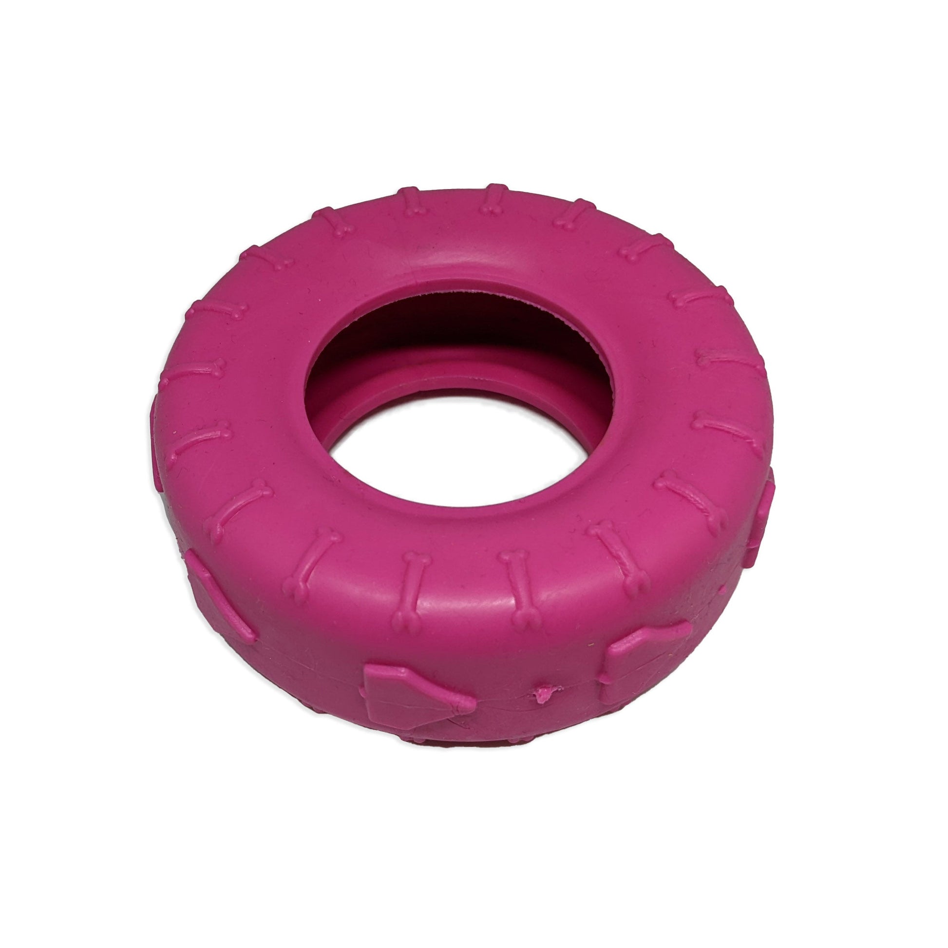 Brinquedo mordedor para cachorro em formato de pneu rosa, com textura em relevo, ideal para morder, brincar e ajudar na distração do pet.